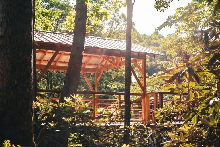 Wooden tent platform deck with railing – Tent Platforms at The Outpost NRG