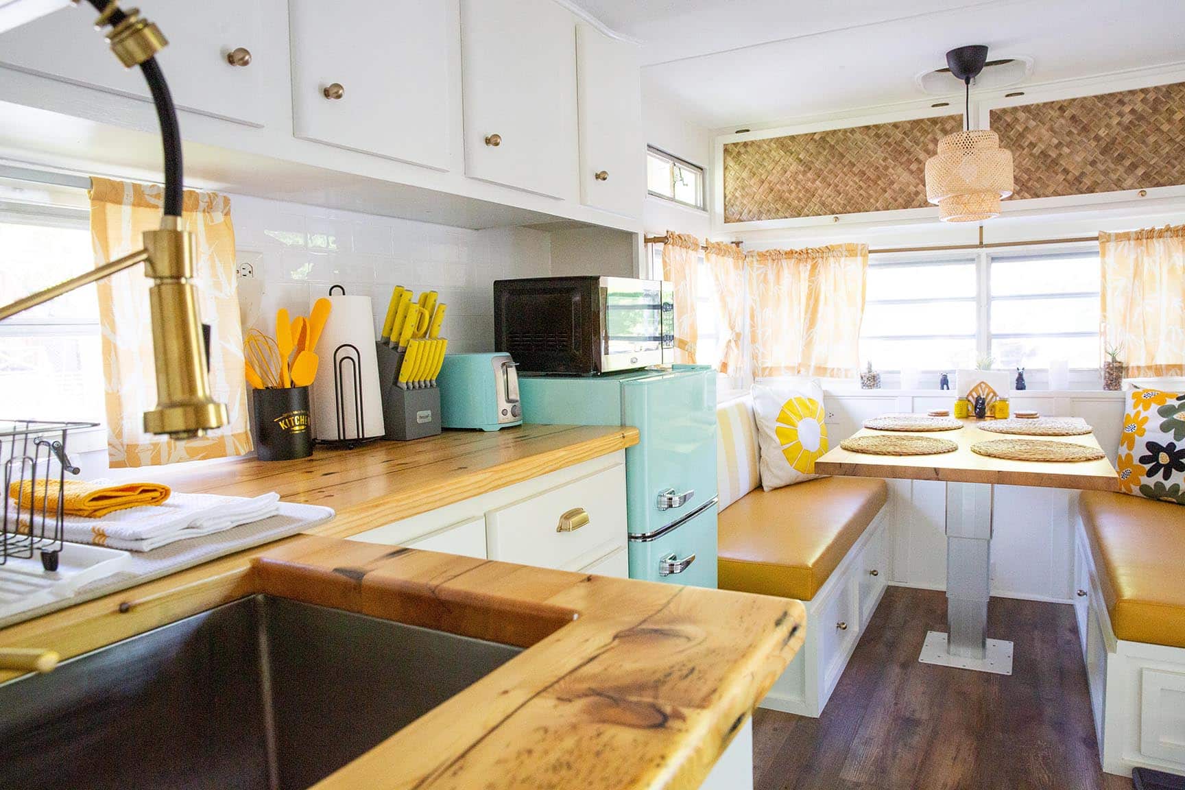 Mellow Yellow kitchen with induction burner – Mellow Yellow Vintage Camper at The Outpost NRG